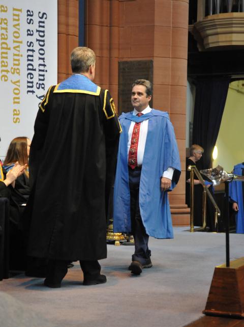 Jeremy Johnston receiving his PhD