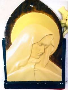 This plaster of paris plaque of the Blessed Mother was made by an Italian POW and given to an interpreter to the Italian prisoners at Camp Douglas. Marian Testolin Offe photo.