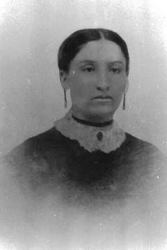 Woman Dress Lamoreaux some years after her courage saved her family's lives when their wagon train was attacked near Split Rock. Lander Pioneer Museum.